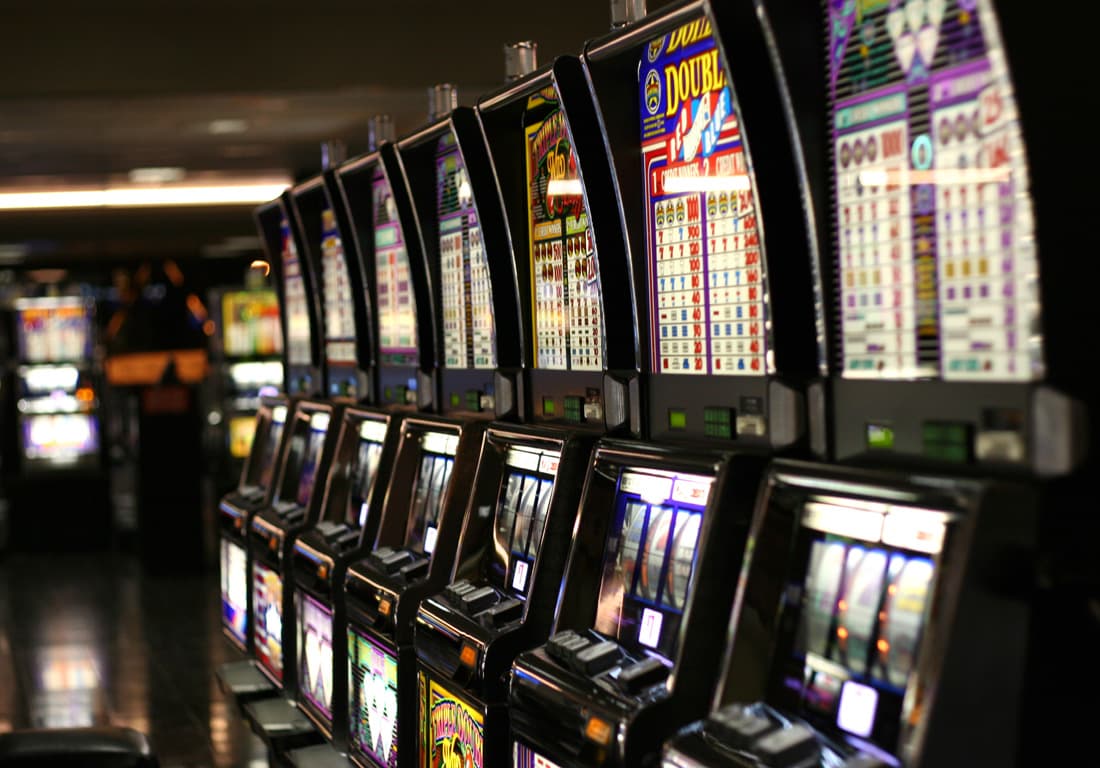 How would you implement a multi-armed bandit for real-time ad optimization?